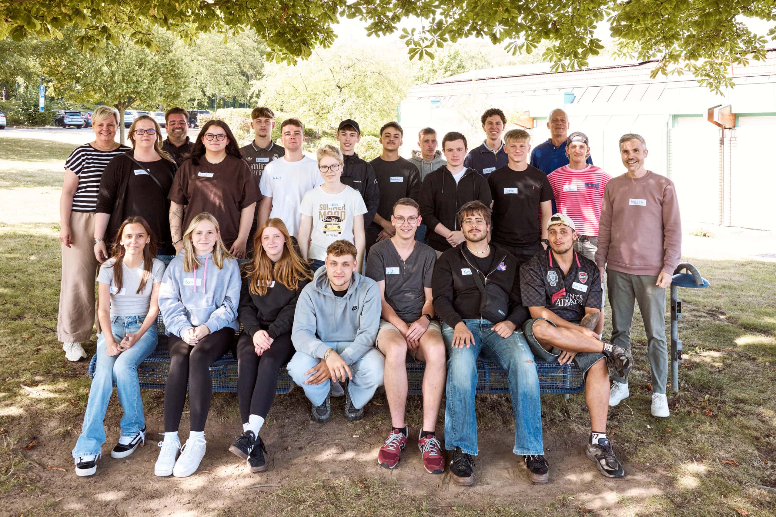 Sport-Thieme apprentices during the apprentice trip posing for a group photo outdoors as part of training and team building activities.